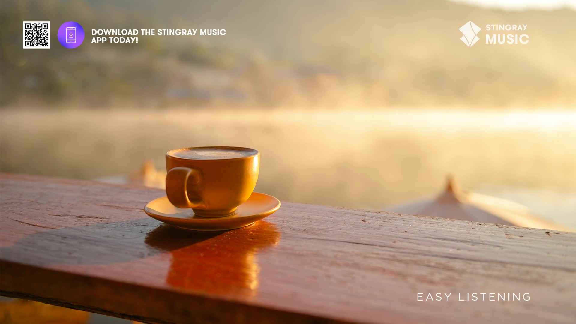 The warm, yellow cup of coffee sits on a wooden table, overlooking a misty lake. The scene feels calm, like the kind of morning you'd find on a Stingray Easy...