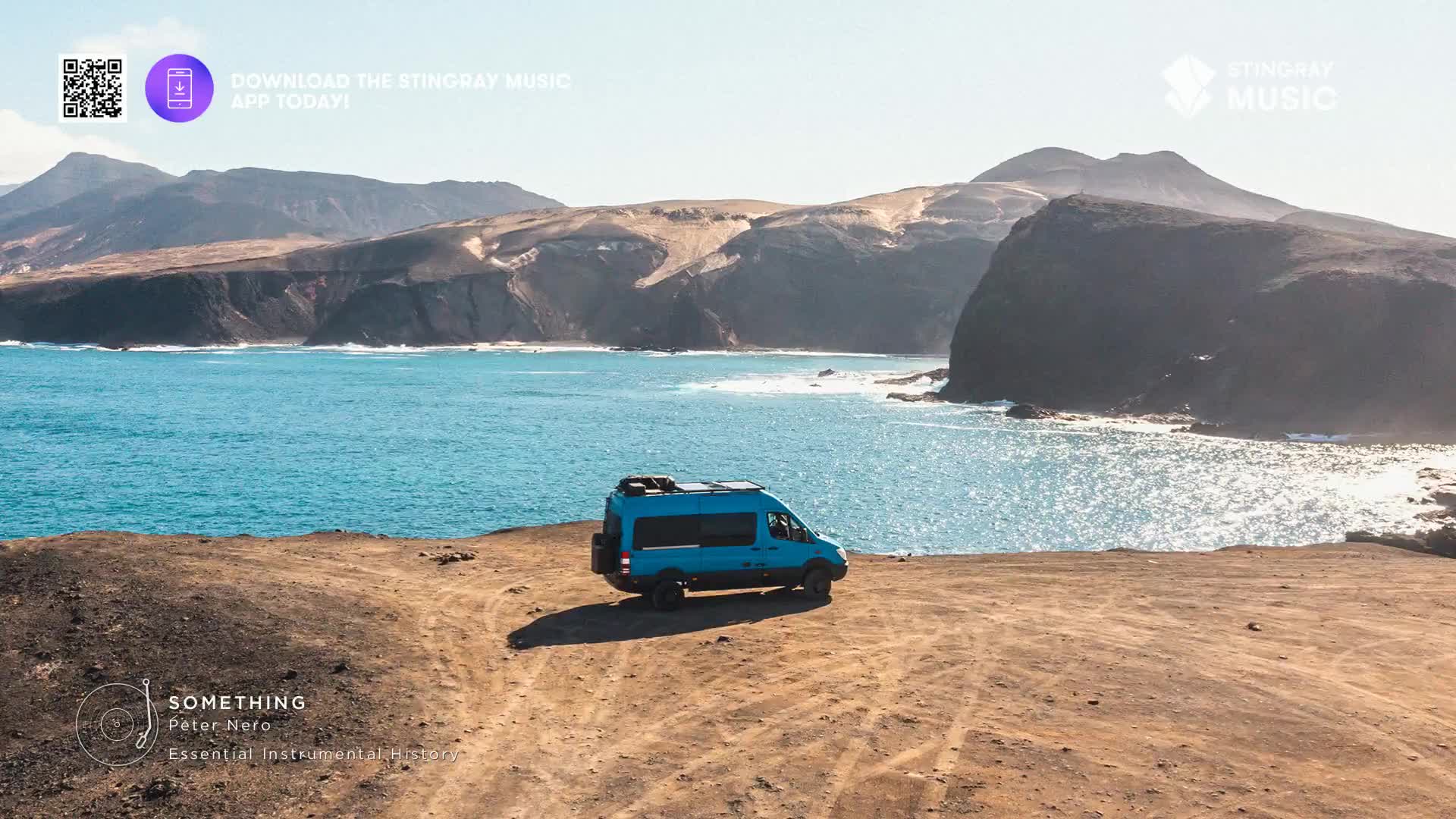 A blue van is parked on a sandy cliff overlooking the ocean. The water looks inviting, and the scene feels like the perfect backdrop for some Stingray Easy L...