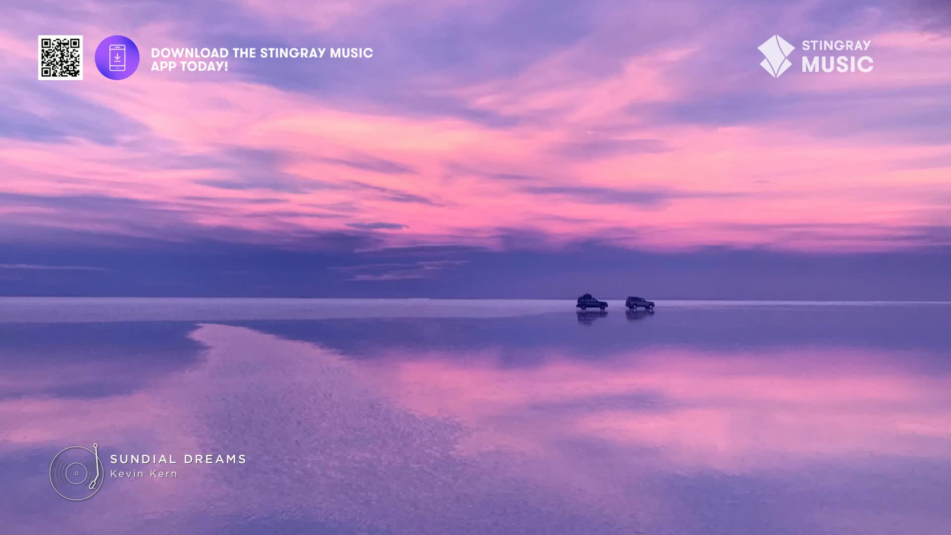 Two small vehicles are driving across a vast, reflective surface, mirroring the pink and purple sky above. The scene feels serene, like something you'd see i...