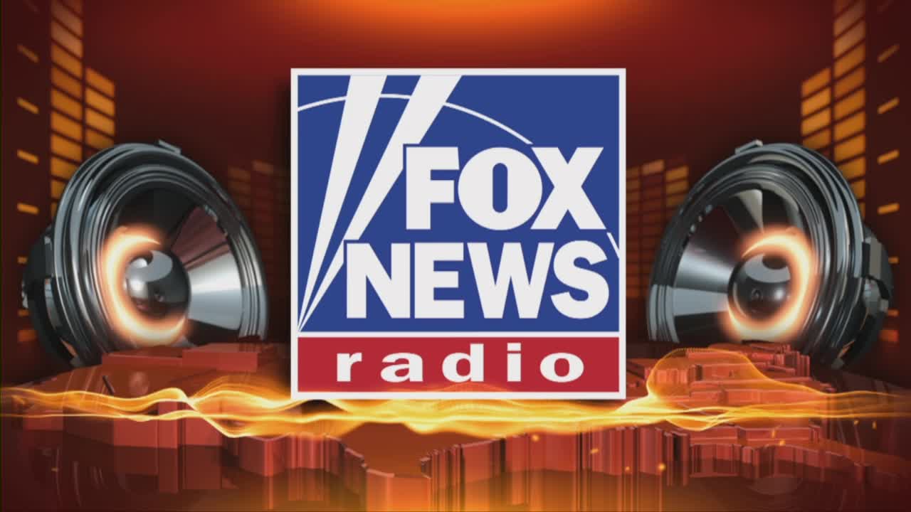 The Fox News Radio logo sits centered against a fiery background, with two large speaker cones flanking it. The speakers pulse with an inner glow, suggesting...