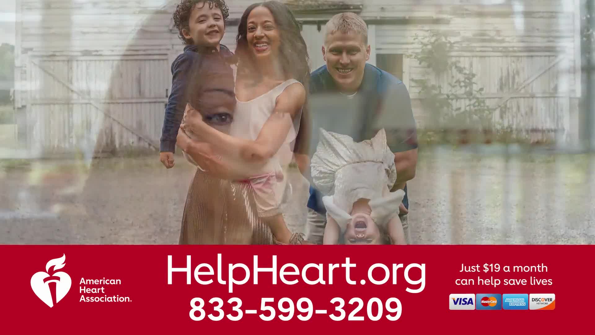A smiling family is outside, the parents holding their children playfully. The ad on Jewish Life Television for the American Heart Association is promoting t...