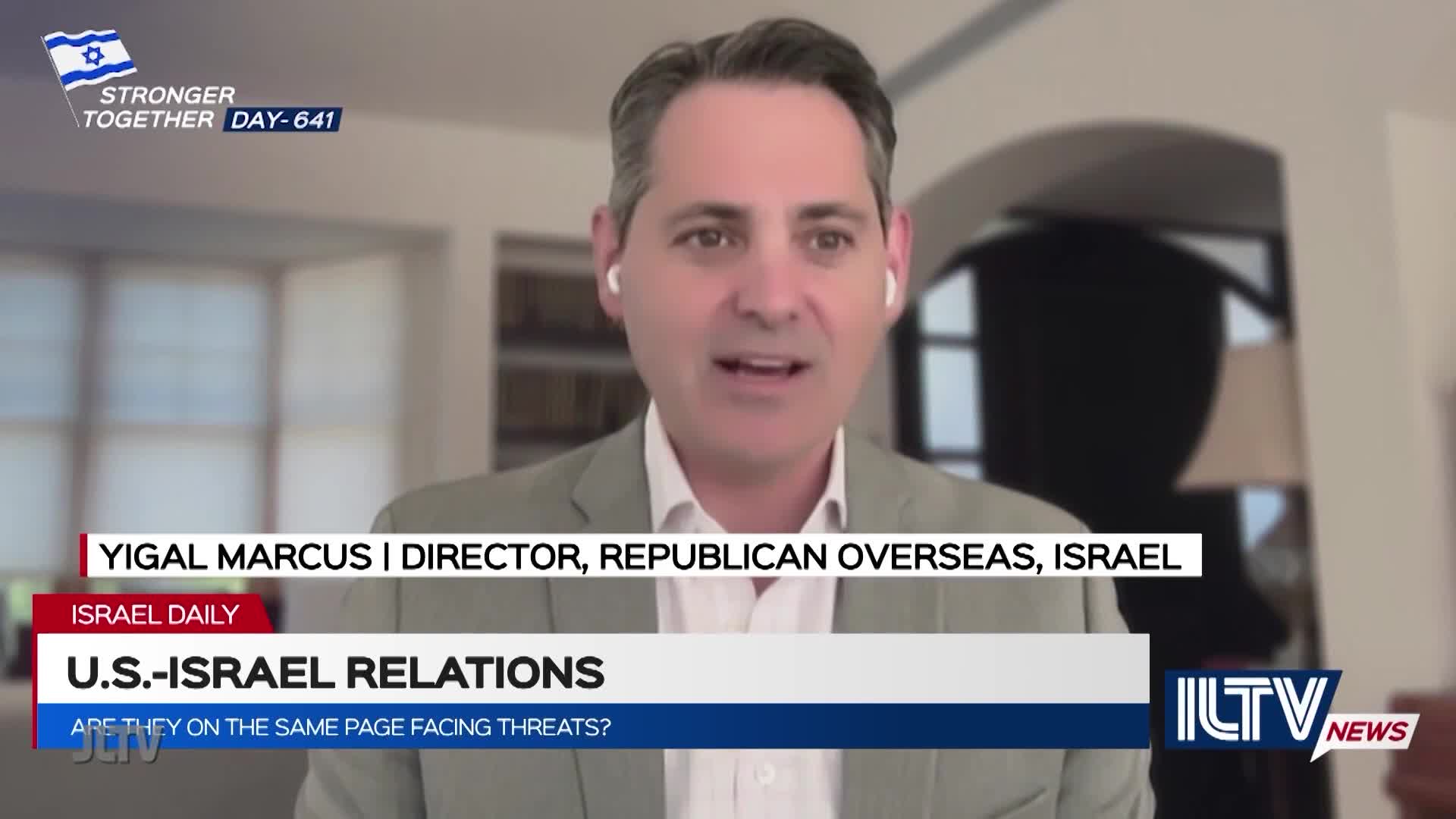 A man in a light jacket is speaking, presumably on Jewish Life Television, with the topic of U.S.-Israel relations. The lower third identifies him as Yigal M...