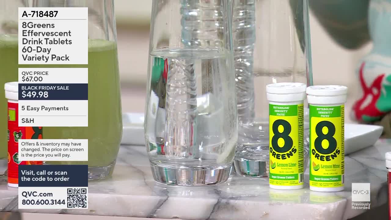 On a marble countertop, two tubes of "8Greens" effervescent tablets sit next to tall glasses of water and a pitcher of green liquid, all under the QVC3 logo....