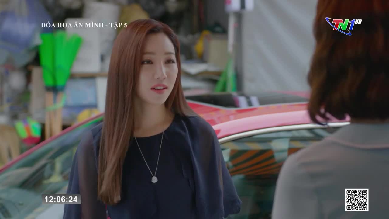 A woman with long brown hair and a dark top is talking, her expression serious. The Thai Nguyen TV logo is visible in the corner, and the time is just after ...